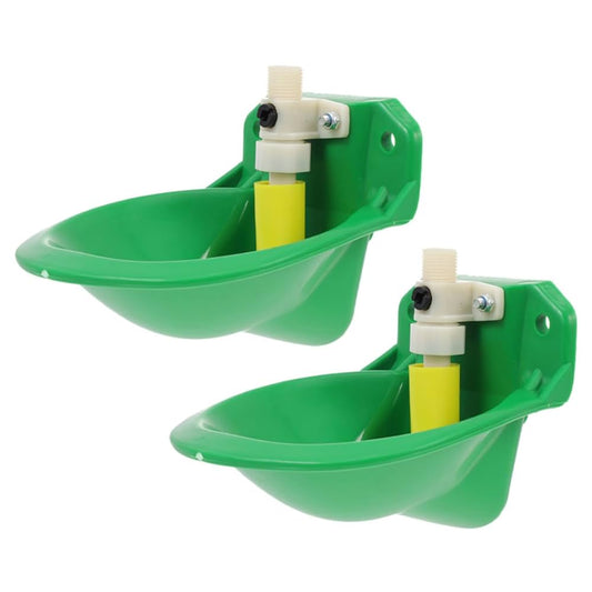 Green farm feeders with yellow nozzles on a white background